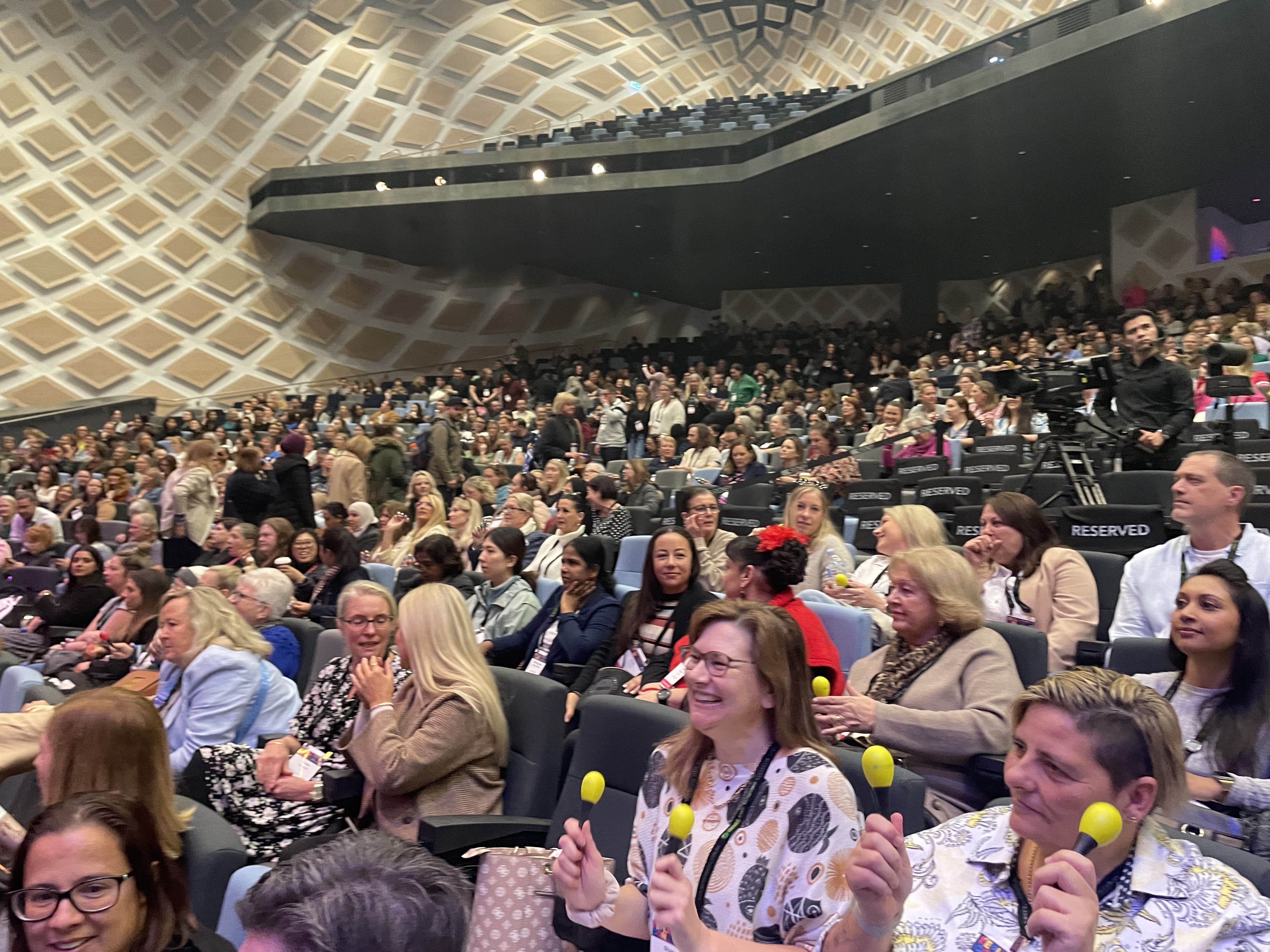 Large conference audience in an auditorium