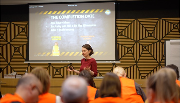 Michelle Rushton presenting to the room during Built to Win