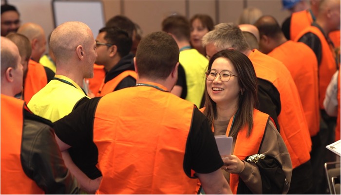 Participants mingling during Built to Win