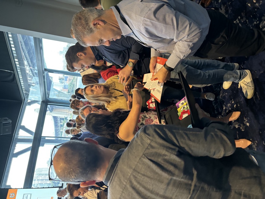 Participants trading Lion Cage asset cards