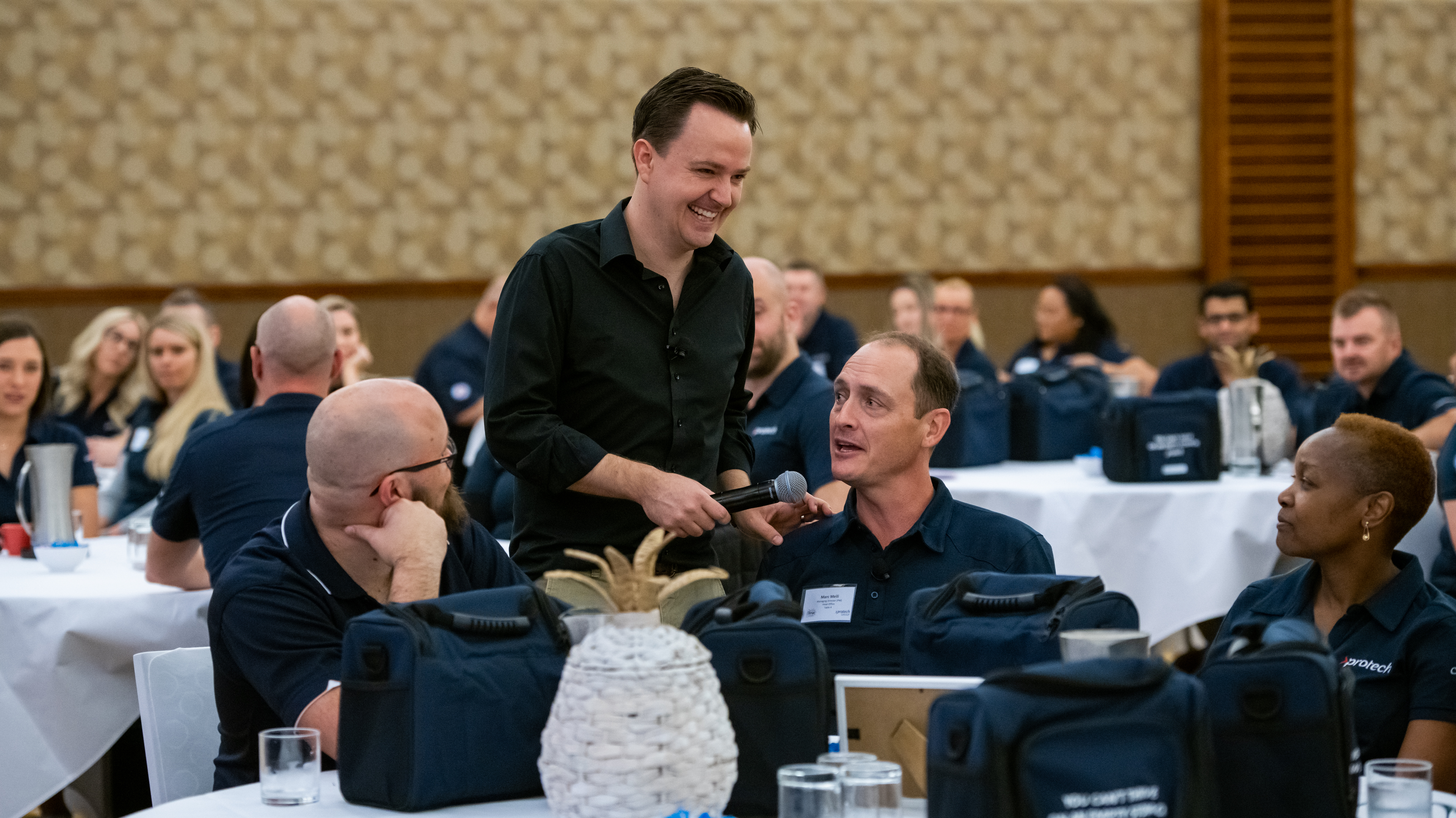 Delegates engaged in a conference session